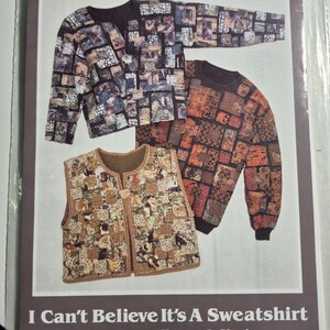 May include: A sewing pattern envelope titled Back Porch Press I Can't Believe It's A Sweatshirt Jacket, Pullover & Vest. The cover displays three garments featuring patchwork-style fabric designs in shades of brown, black, and orange.