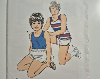 Kwik Sew 1164 boys' tank top and shorts, sizes 4,5,6,7, uncut, factory folded and sealed, see description and photos C.1981
