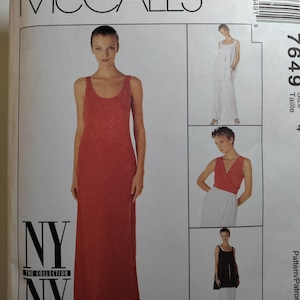 May include: McCall's sewing pattern number 7649 for a sleeveless dress. The pattern includes three different styles of dresses, all with a simple, elegant design.