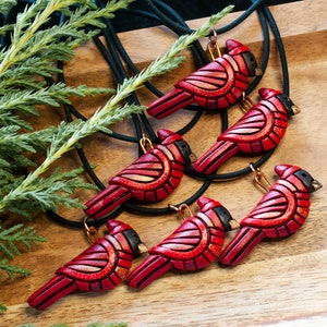 Photo shows 6 bright red mini cardinal mosaic pendants on black cords (Listing includes one cardinal)