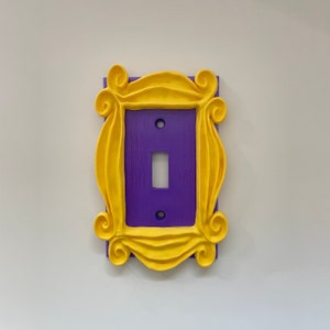 Friends' Inspired Peephole Frame Light Switch Cover - Monica's Purple Wall Tribute!