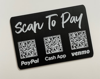 May include: Black rectangular card with rounded corners. The white text "Scan To Pay" is at the top. Below are three QR codes with the payment app names PayPal, Cash App, and Venmo.