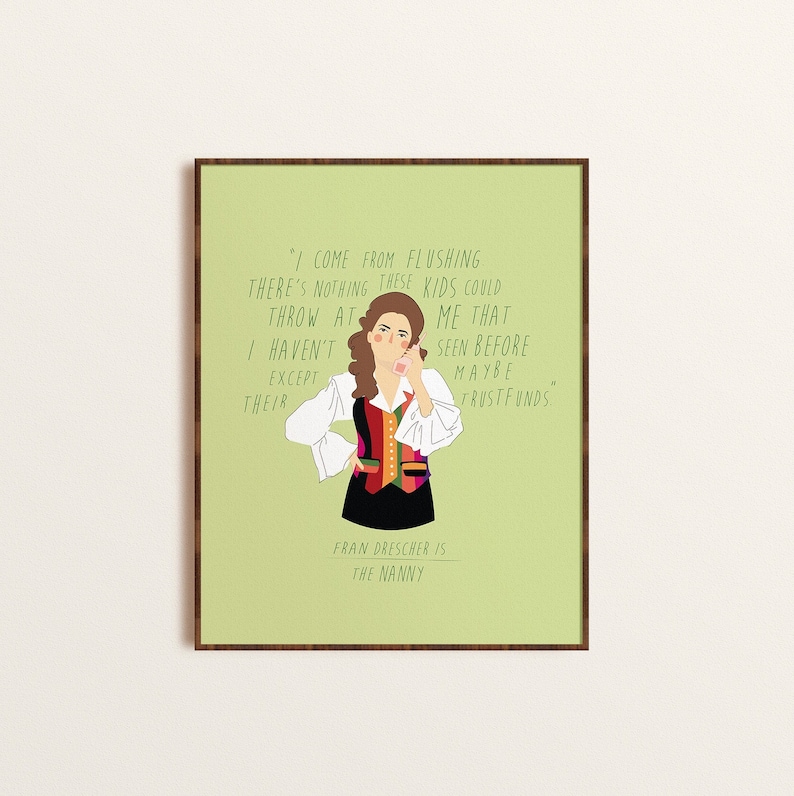 May include: A framed art print featuring an illustration of Fran Drescher from "The Nanny." The artwork depicts Fran in a colorful outfit, holding a phone, with a quote from the show. The background is light green, and the frame is brown.