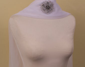 Elegant bridal unique neck veil with handmade applique using vintage crystal beads on white tulle with a veil-like drop at the back.