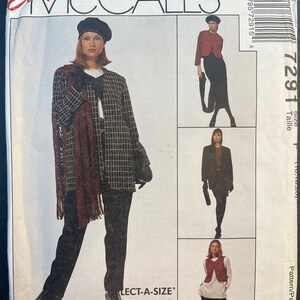 May include: A sewing pattern for a jacket, vest, and pants. The pattern is from McCall's and is called "Sew News". The pattern is for a petite size and is called "Select-A-Size".
