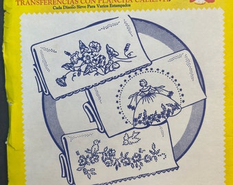 May include: A vintage package of iron-on transfers for embroidery, fabric painting, and other crafts. The package features a colorful illustration of a morning glory flower design and the text "Aunt Martha's Hot Iron Transfers 3285 - Morning Glory Pillowslip".