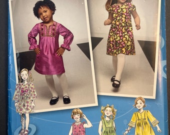 Toddlers Dress with Sleeve and Trim Variations Girls Sewing Pattern Simplicity 2320 Uncut Size 1/2 1 2 3 or 4 5 6 7 8