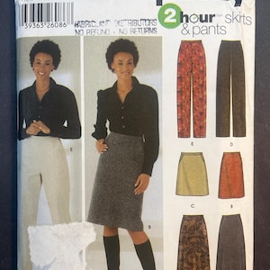May include: A sewing pattern for skirts and pants. The pattern includes instructions for making a long skirt, a short skirt, a pair of pants, and a pair of capris. The pattern is for sizes 6, 8, 10, and 12. The pattern is from Simplicity and is called "2 hour skirts & pants".