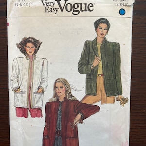 May include: A sewing pattern for a long jacket with a mandarin collar. The pattern is for sizes 6-8-10 and is from Very Easy Vogue. The pattern is illustrated with three women wearing different versions of the jacket.