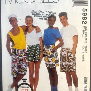 May include: McCall's sewing pattern featuring four people wearing shorts with various patterns. The pattern includes the text "Sew Fine Fabrics" and "The Easy 60 min Pattern". The size is listed as EX-SMALL.