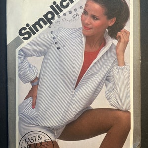 May include: Simplicity sewing pattern number 9978 for a jacket with a striped design. The pattern is for a young woman and costs £2.50. The text "Fast & Fabulous, Rapide & Chic" is printed on the pattern.