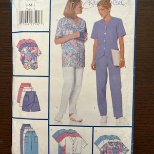 May include: A sewing pattern for a uniform top and trousers. The pattern is for sizes S-M-L and is from Butterick. The pattern includes a variety of styles, including a tunic top, a button-up shirt, and a pair of trousers.