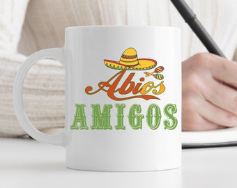 Graduation gift mug with a funny saying and design. ABIOS AMIGOS. Congratulate your child on their graduation with this ceramic mug!
