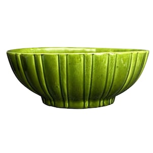 May include: A round ceramic bowl with a vibrant lime green glaze and a glossy finish. The exterior features vertical fluted ridges that extend from the base to the rim, creating a textured, scalloped appearance around the entire circumference.