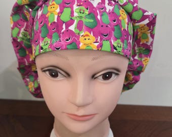 Childrens purple dinosaur surgical scrub bouffant hat