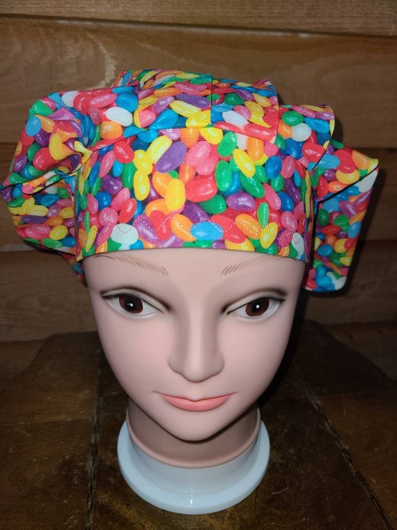 Surgical Scrub Hats/Caps Easter   Colorful Jelly Beans on white background 