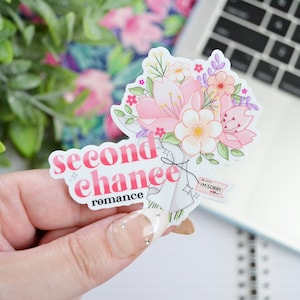 May include: A pink and white floral bouquet sticker with the text "second chance romance" and a small tag that says "I'm sorry".