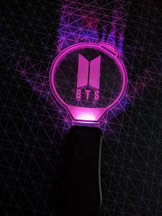 Download Light Up the Night with BTS Army Bomb Wallpaper