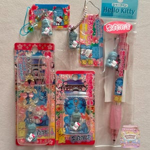 Hello Kitty Buddha Statue Holding HK 2006 Vintage Gotochi Charm Keychain