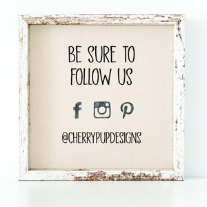 May include: White wooden frame with a beige canvas background. The text "BE SURE TO FOLLOW US" is printed in black. Below the text are social media icons for Facebook, Instagram, and Pinterest. The text "@CHERRYPUPDESIGNS" is printed in black below the icons.
