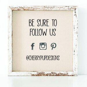 May include: A white wooden frame with a beige canvas background. The text "BE SURE TO FOLLOW US" is printed in black. Below the text are social media icons for Facebook, Instagram, and Pinterest. The text "@CHERRYPUPDESIGNS" is printed in black below the icons.