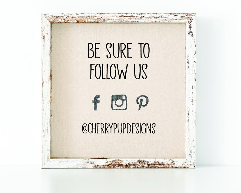 May include: A white wooden frame with a beige canvas background. The text "BE SURE TO FOLLOW US" is printed in black. Below the text are social media icons for Facebook, Instagram, and Pinterest. The text "@CHERRYPUPDESIGNS" is printed in black below the icons.