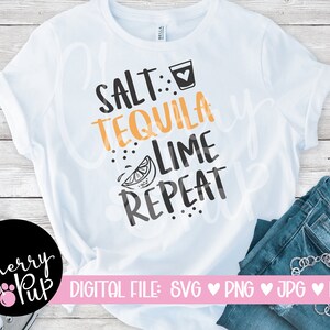 Könnte beinhalten: Weißes T-Shirt mit dem Text "Salt: Tequila Lime Repeat" in schwarzer und orangefarbener Schrift. Ein Limettenkeil und ein Schnapsglas sind im Design enthalten.