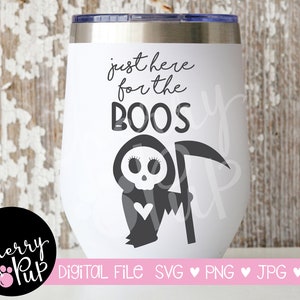 May include: White tumbler with a black and white graphic of a Grim Reaper holding a scythe. The text "just here for the boos" is written in black above the graphic.