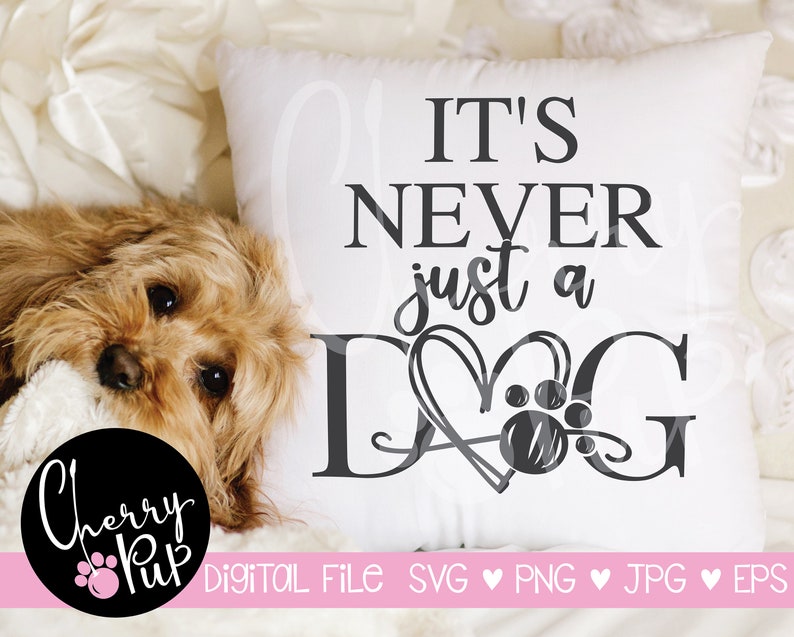 May include: White pillow with the text "IT'S NEVER just a DOG" in black. The word "DOG" features a heart and paw print design. A small, brown dog is lying next to the pillow. The image also includes the text "Cherry Pup" in a circle.