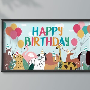 May include: A colorful birthday banner with the words "Happy Birthday" in a whimsical font. The banner features a variety of animals wearing party hats, including a zebra, a giraffe, a flamingo, a lion, a deer, a bear, a leopard, and an elephant. The banner is decorated with balloons in various colors.