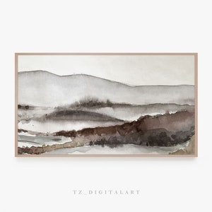 May include: Abstract watercolor painting of a landscape with brown and gray hills and a river in the foreground. The painting is framed in a light brown frame.