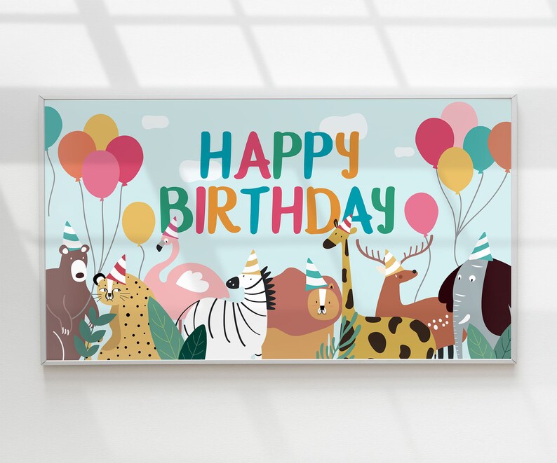 May include: A colorful banner with the text "Happy Birthday" and a variety of animals including a zebra, giraffe, flamingo, lion, deer, elephant, and bear. The banner is decorated with balloons in shades of pink, red, yellow, and blue.