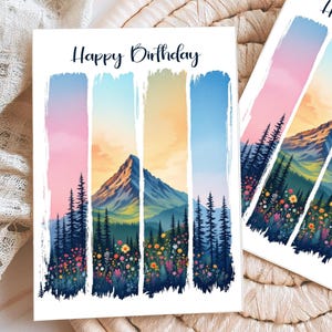 Cartão de aniversário de montanha de flores silvestres para impressão para amantes da natureza, cartão de feliz aniversário com pinceladas de aquarela para caminhadas, download digital