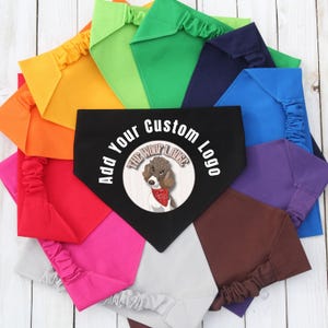 May include: A variety of colors of dog bandanas with a black bandana in the center that says "Add Your Custom Logo" and has a small image of a dog wearing a bandana.
