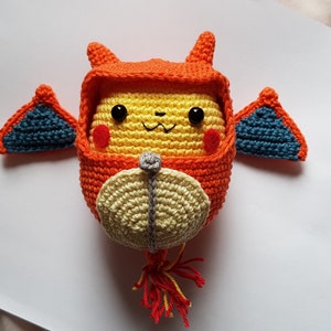 Cute Pikachu in a Charizard sleeping bag crochet pattern