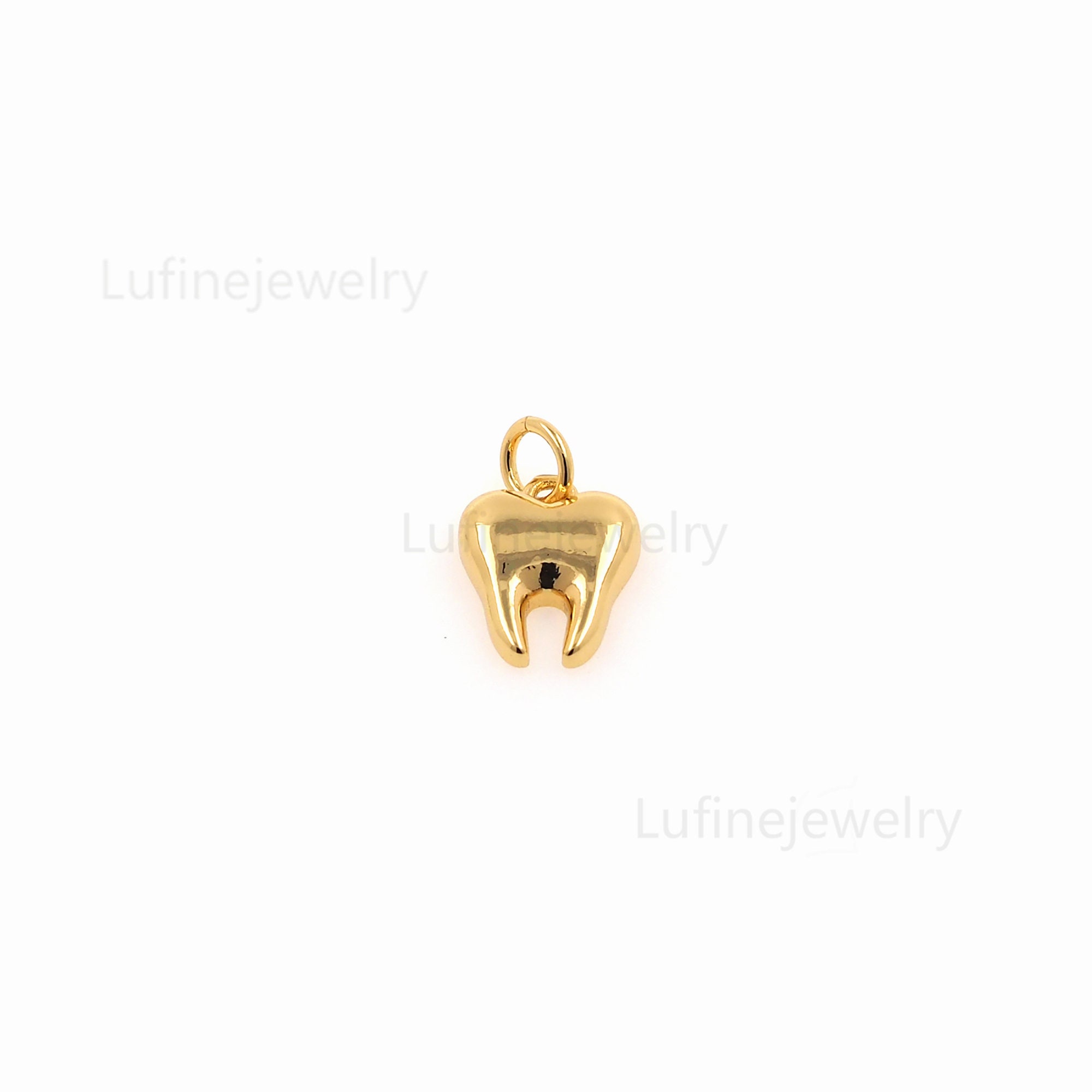 Gold Tooth Gem 18ct - Louis Vuitton - dental jewelry