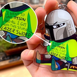 Ich wollte meinen Sohn retten, aber alles, was ich bekam, war dieses blöde Lasersword Chibi | The Mandalorian Schlüsselanhänger aus Acryl