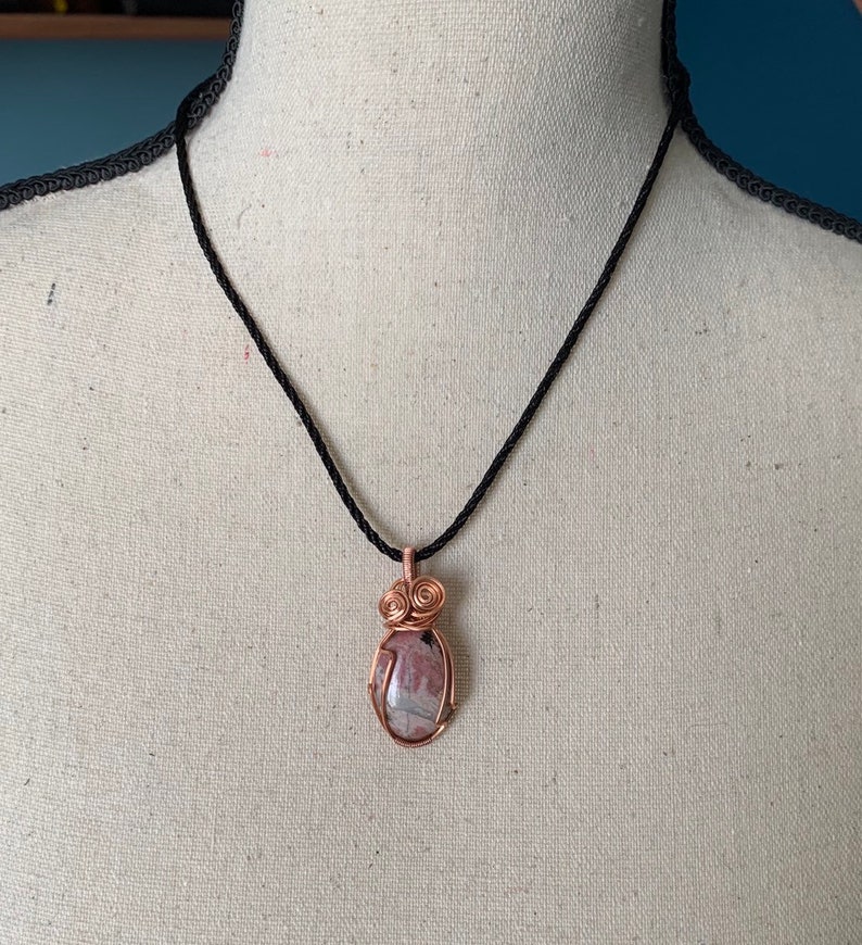 Rhodonite and twisted copper pendant