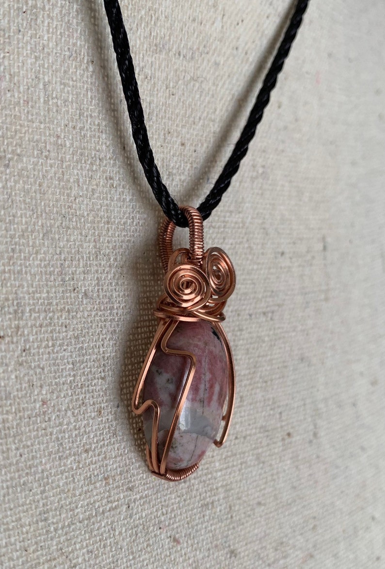 Rhodonite and twisted copper pendant