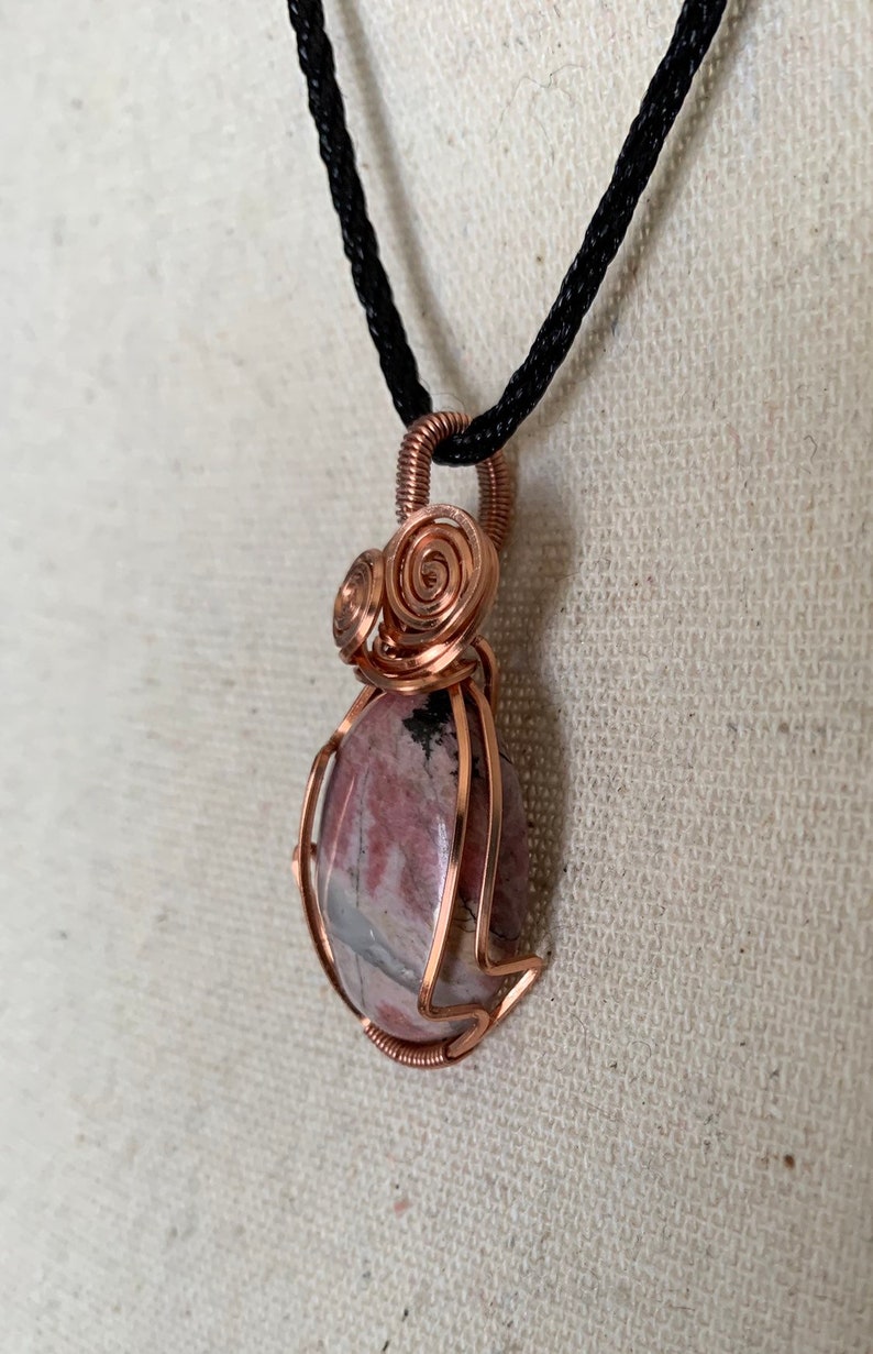 Rhodonite and twisted copper pendant