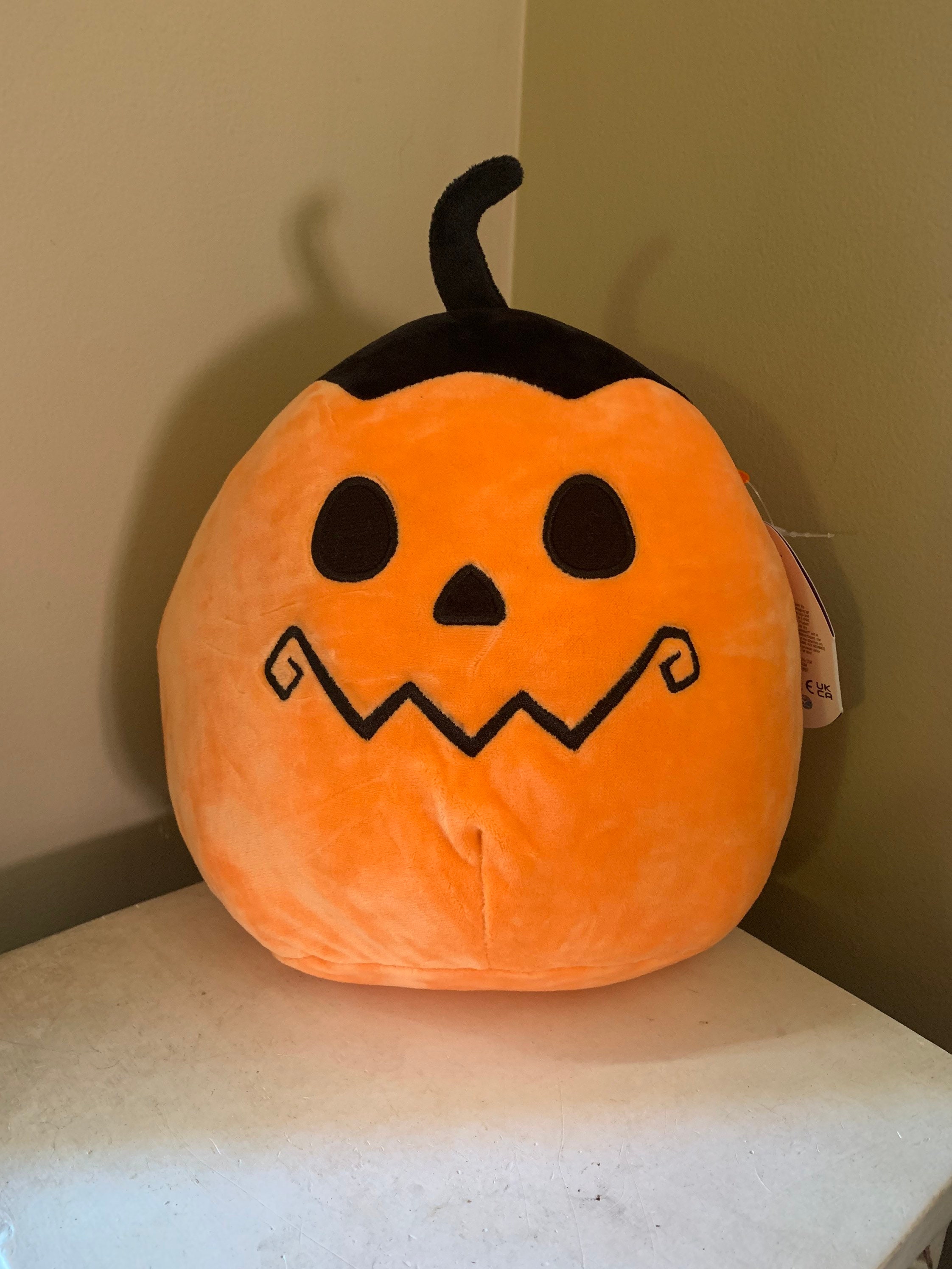 wade in a pumpkin squishmallow