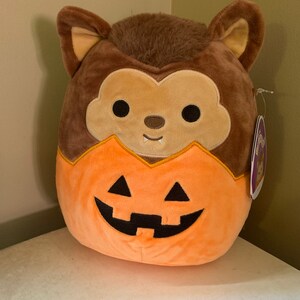 wade in a pumpkin squishmallow