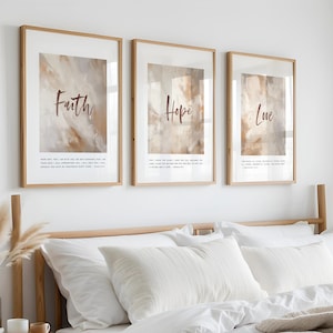 May include: Three framed prints with watercolour-style backgrounds and the words "Faith", "Hope", and "Love" in a brown script font. Each print includes a short quote below the word.