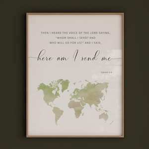 May include: A framed print with a world map in green and beige watercolour style. The text reads: "Then I heard the voice of the Lord saying, 'Whom shall I send? And who will go for us?' And I said, here am I send me." The scripture reference Isaiah 6:8 is also present.