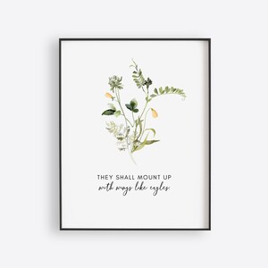 May include: A watercolor print with a floral design and the quote "They shall mount up with wings like eagles."