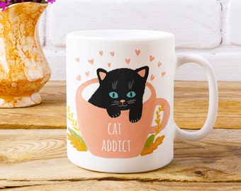 Katzensüchtige Kaffeetasse | Geschenk für Espressoliebhaber | Schwarze Kitty Lost in einer rosa Tasse für sie oder für Ihn