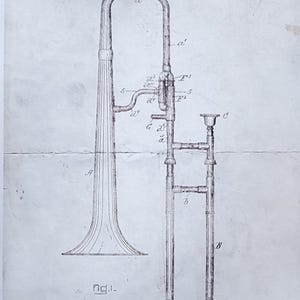May include: A black and white line drawing of a slide trombone patent. The drawing shows the trombone in detail, including the slide, valves, and bell. The patent number, inventor's name, and date are also included in the drawing. The text reads: "No. 699,681. J. HANKEY. SLIDE TROMBONE. Application filed June 18, 1901. Patented May 13, 1902."