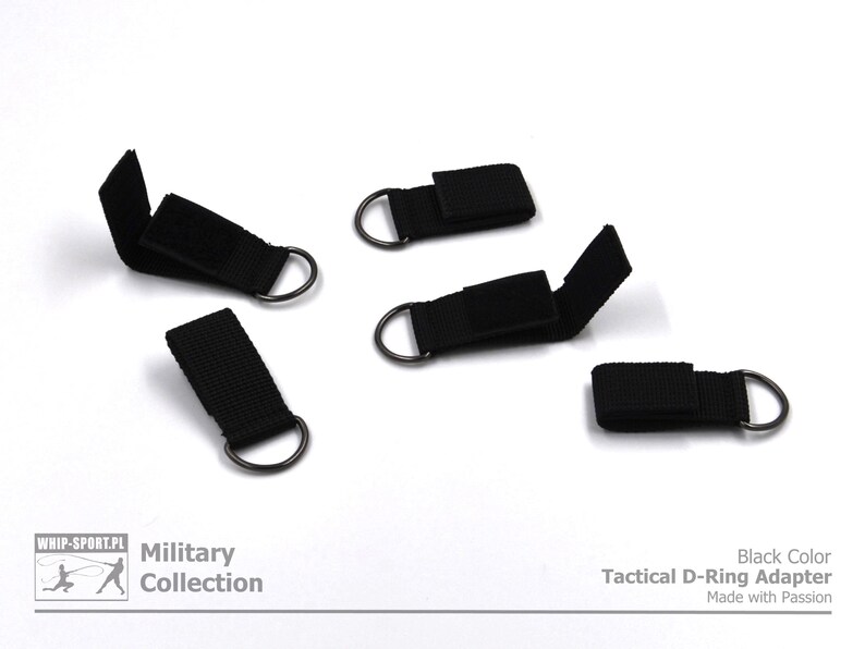 Pode incluir: Cinco adaptadores t&aacute;ticos de anel em D pretos com fecho de velcro. Cole&ccedil;&atilde;o Militar. Cor preta. Adaptador t&aacute;ctico de anel em D. Feito com paix&atilde;o.