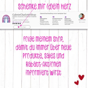 May include: Pink text on a white wood background reads "Schenke mir (d)ein Herz". Below the text is a shop banner with the name "GalerieCharlotteShop" and a five-star rating. The text "Folge meinem shop, damit du immer &uuml;ber neue Produkte, sales und Rabatt-Aktionen informiert wirst" is below the banner.