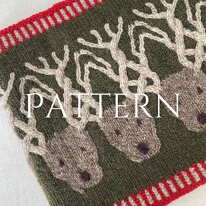 May include: Knitted green fabric with a red and white striped border. The fabric features a repeating pattern of three reindeer heads with antlers.